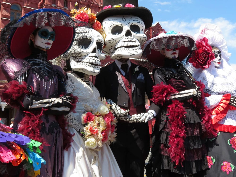 People dressed up in celebration of the Day of the Dead