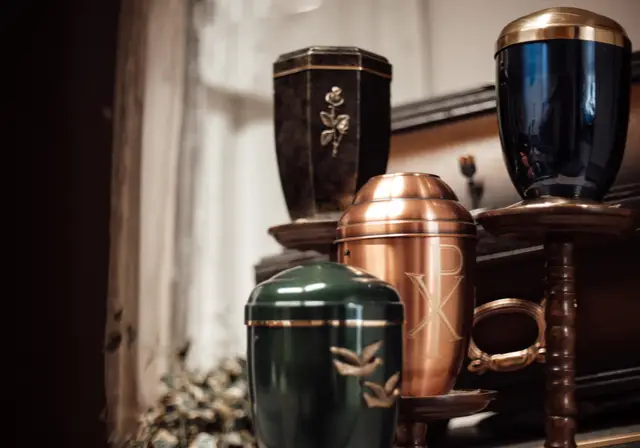 Urns on display in a funeral home