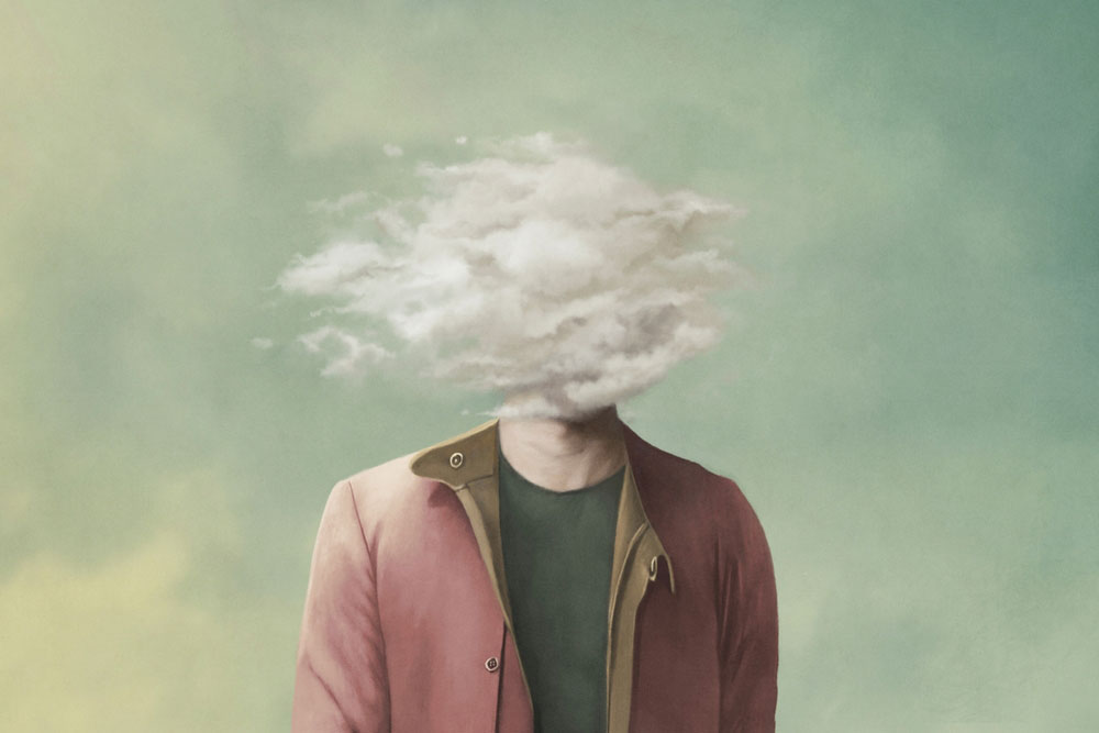 Man with clouds in front of his face